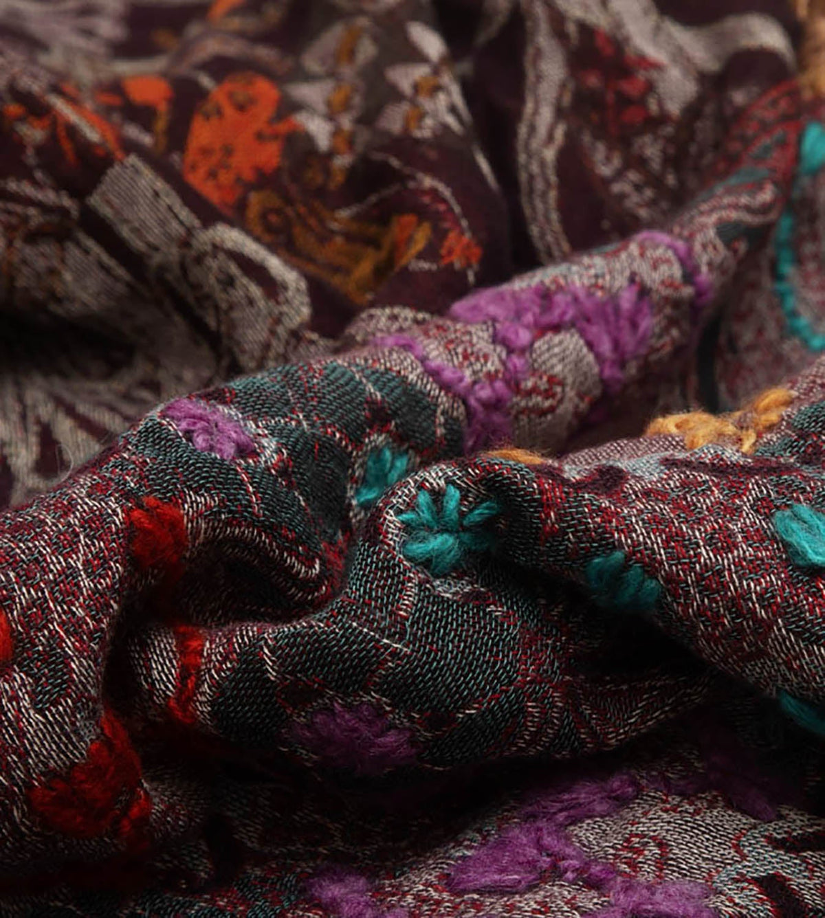 Close-Up of different colours of cotton and silk scarves 